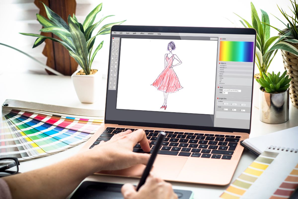 clothes designing using technology on laptop