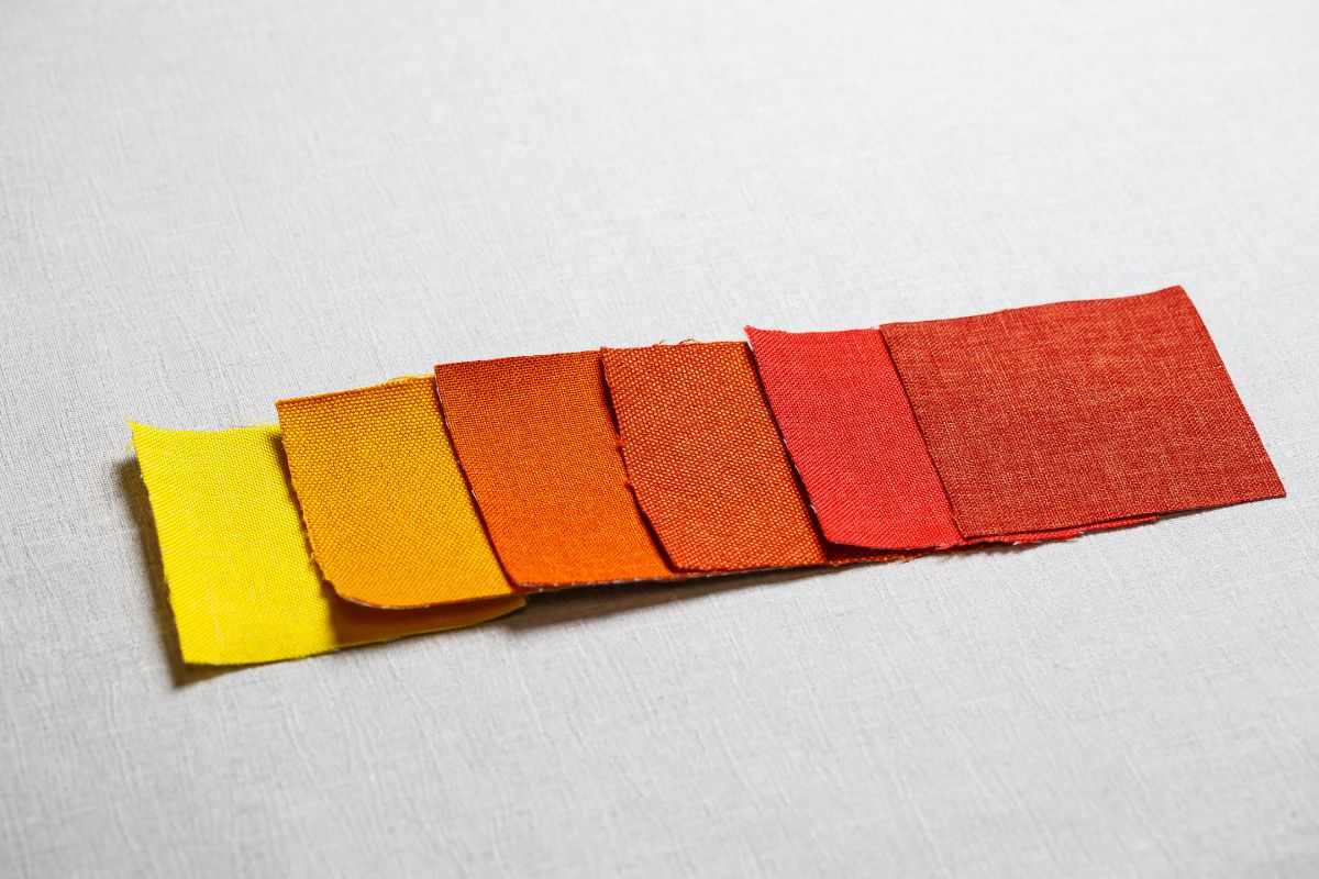 lab dip with small colored square fabric cuttings