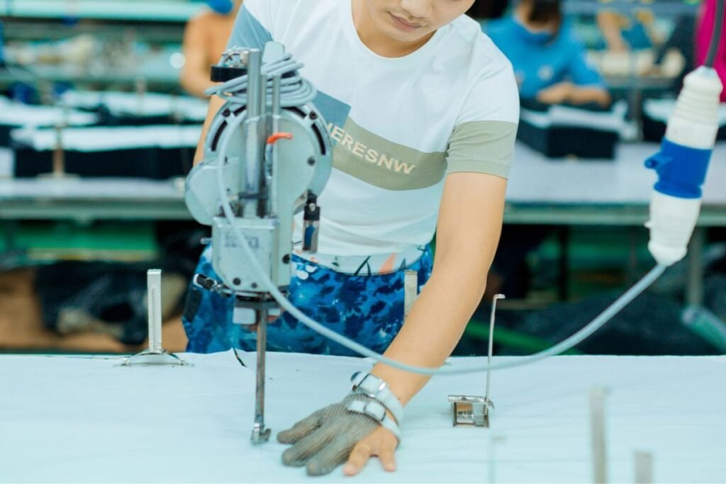 sewing fabric by skilled worker in kiara garments factory