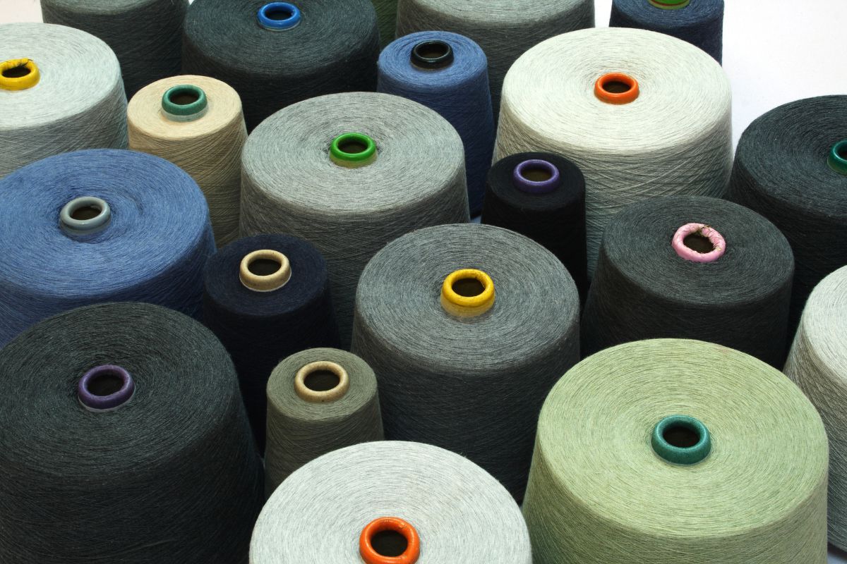 fibers are spinned into yarns rolls